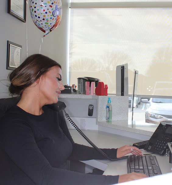 Lucas Family Dentistry team answering the phone