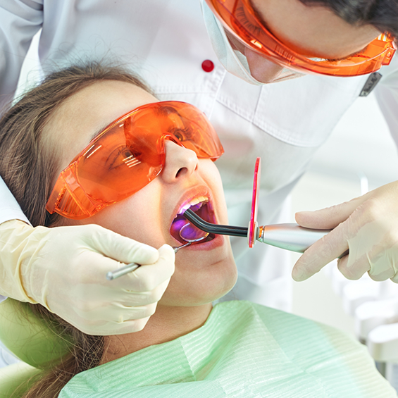 Woman getting cosmetic dental bonding