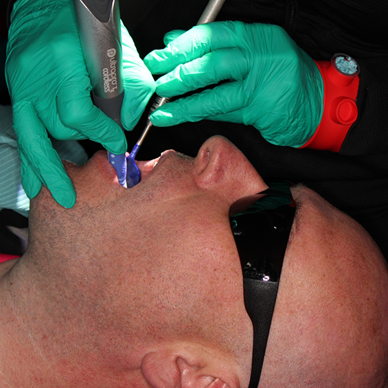 Man receiving root canal treatment