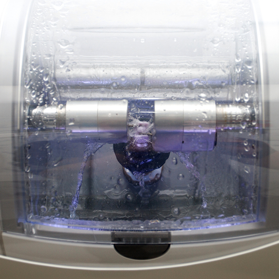 Milling machine creating a dental crown