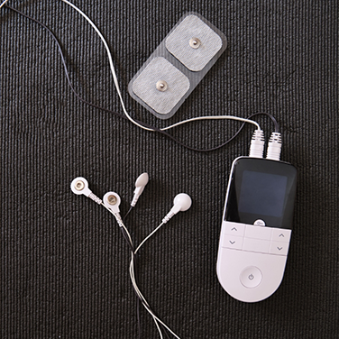 Small device attached to electrodes